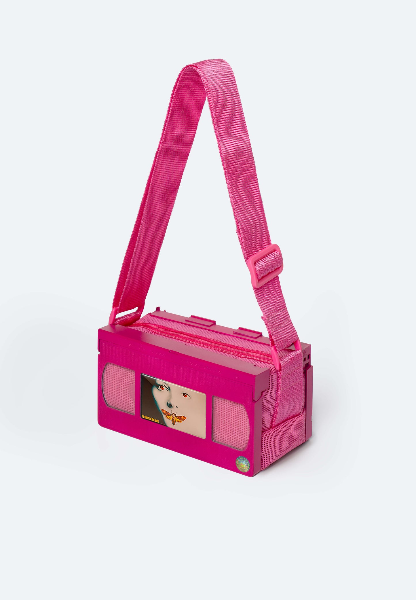 Fuchsia VHS Bag customized with the Silence of the Lambs inspired magnet, collectible Movie Charm for VHS bags, a tribute to the iconic psychological thriller starring Hannibal Lecter